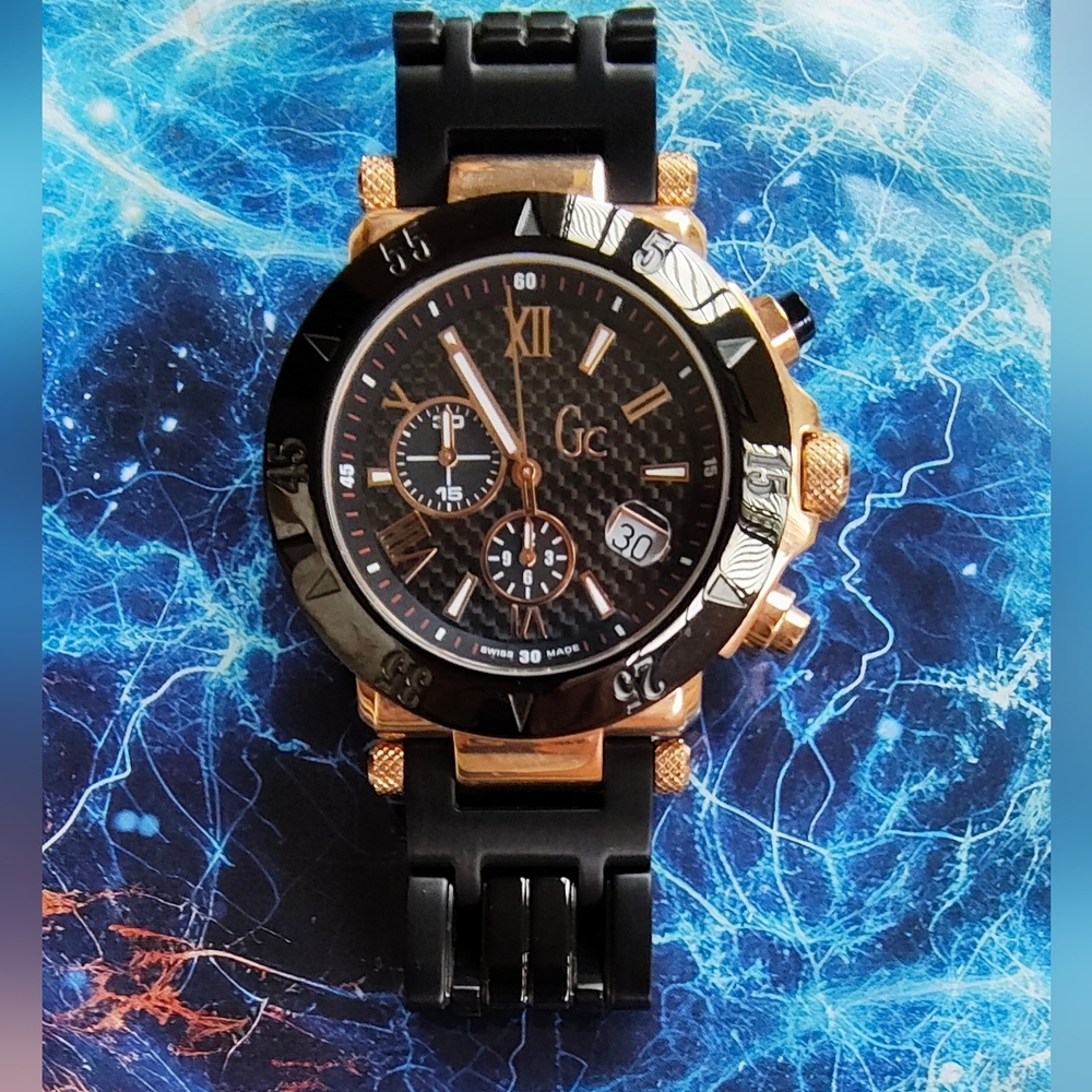 Guess Collection G47000G / 100 Meters/ 330 Feet Water Resistant Swiss Made